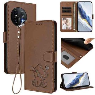For OnePlus 11 Embossed Heart Cat Leather Phone Case with Hand Strap(Brown)