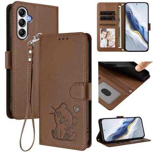 For Samsung Galaxy A25 5G Global Embossed Heart Cat Leather Phone Case with Hand Strap(Brown)