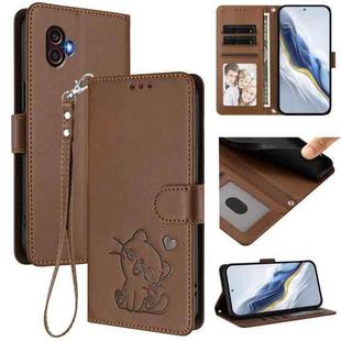 For Samsung Galaxy XCover6 Pro Embossed Heart Cat Leather Phone Case with Hand Strap(Brown)