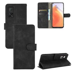 For Xiaomi Mi 10T Solid Color Skin Feel Magnetic Buckle Horizontal Flip Calf Texture PU Leather Case with Holder & Card Slots & Wallet(Black)