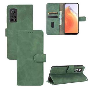 For Xiaomi Mi 10T Solid Color Skin Feel Magnetic Buckle Horizontal Flip Calf Texture PU Leather Case with Holder & Card Slots & Wallet(Green)