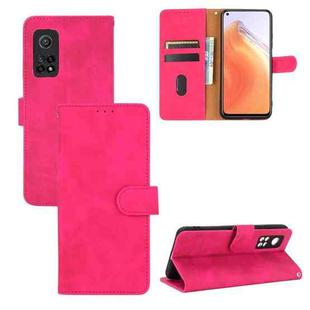 For Xiaomi Mi 10T Solid Color Skin Feel Magnetic Buckle Horizontal Flip Calf Texture PU Leather Case with Holder & Card Slots & Wallet(Rose Red)