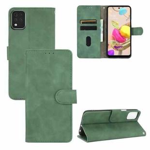 For LG K42 Solid Color Skin Feel Magnetic Buckle Horizontal Flip Calf Texture PU Leather Case with Holder & Card Slots & Wallet(Green)