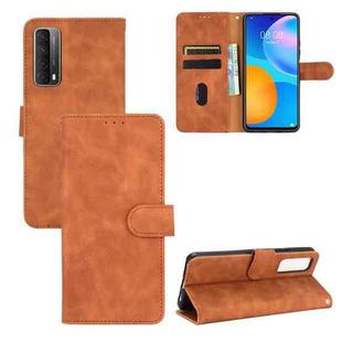 For Huawei P Smart 2021 / Y7A Solid Color Skin Feel Magnetic Buckle Horizontal Flip Calf Texture PU Leather Case with Holder & Card Slots & Wallet(Brown)