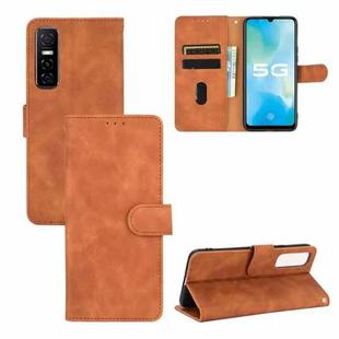 For vivo Y73s Solid Color Skin Feel Magnetic Buckle Horizontal Flip Calf Texture PU Leather Case with Holder & Card Slots & Wallet(Brown)