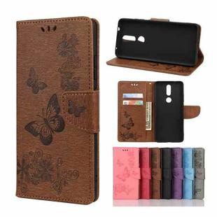 For Nokia 2.4 Butterflies Embossing Horizontal Flip Leather Case with Holder & Card Slots & Wallet(Brown)