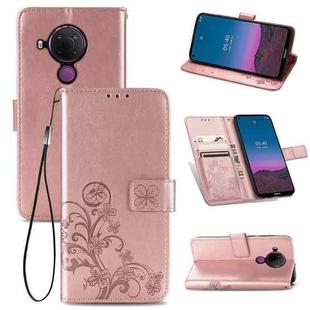 For Nokia 5.4 Four-leaf Clasp Embossed Buckle Mobile Phone Protection Leather Case with Lanyard & Card Slot & Wallet & Bracket Function(Rose Gold)