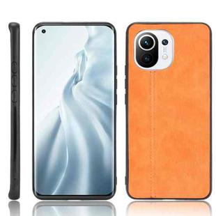 For Xiaomi Mi 11 Shockproof Sewing Cow Pattern Skin PC + PU + TPU Case(Orange)