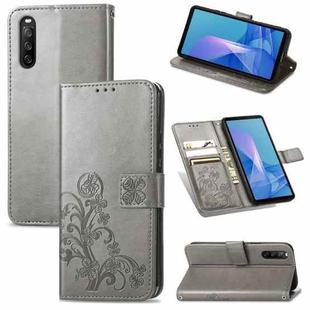 For Sony Xperia 10 III Four-leaf Clasp Embossed Buckle Mobile Phone Protection Leather Case with Lanyard & Card Slot & Wallet & Bracket Function(Gray)