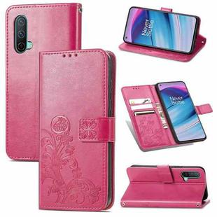 For OnePlus Nord CE 5G Four-leaf Clasp Embossed Buckle Mobile Phone Protection Leather Case with Lanyard & Card Slot & Wallet & Bracket Function(Magenta)