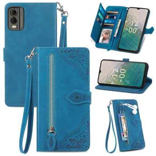 For Nokia C32 Embossed Flower Zipper Leather Phone Case(Blue)