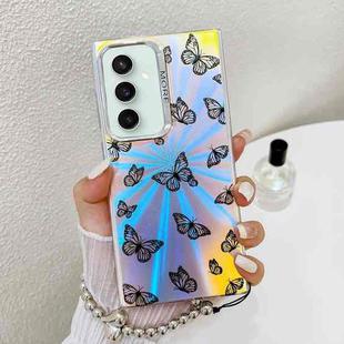 For Samsung Galaxy S23 FE 5G Electroplating Laser Butterfly Phone Case with Wrist Strap(Black Butterflies AB5)