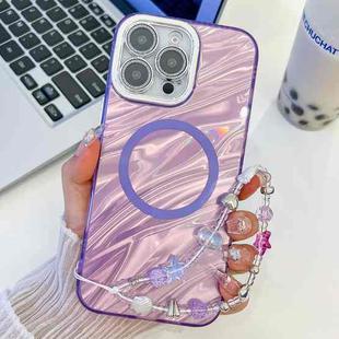 For iPhone 16 Pro Plating Texture Wristband MagSafe TPU Phone Case with Glitter Lens Film(Purple Water Ripples)