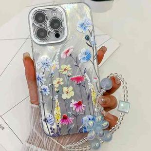 For iPhone 16 Pro Electroplating Flowers Plants Texture Wristband TPU Phone Case(Wildflower FL2)