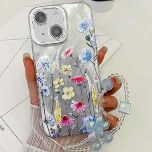 For iPhone 15 Electroplating Flowers Plants Texture Wristband TPU Phone Case(Wildflower FL2)