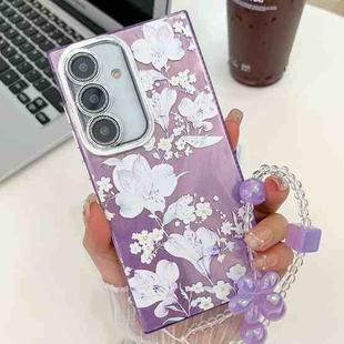 For Samsung Galaxy S24 FE 5G Electroplating Flowers Plants Texture Wristband TPU Phone Case(Pale Purple FlowerFL11)