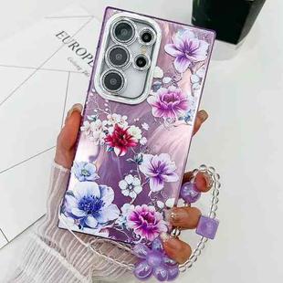 For Samsung Galaxy S23 Ultra 5G Electroplating Flowers Plants Texture Wristband TPU Phone Case(Purple Flowers FL1)