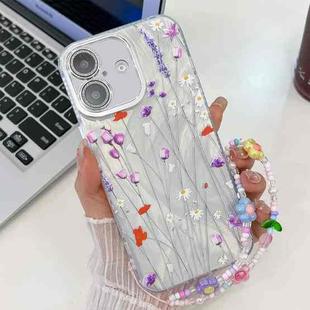 For iPhone 16 Plus Electroplating Flower Texture Wristband TPU Phone Case(Purple Wildflowers SH1)