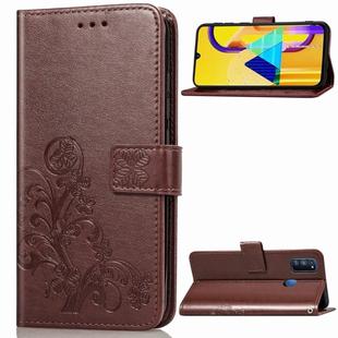 For Galaxy M30   Four-leaf Clasp Embossed Buckle Mobile Phone Protection Leather Case with Lanyard & Card Slot & Wallet & Bracket Function(Brown)