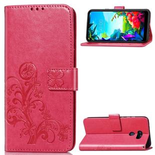 For LG K40S  Four-leaf Clasp Embossed Buckle Mobile Phone Protection Leather Case with Lanyard & Card Slot & Wallet & Bracket Function(Magenta)