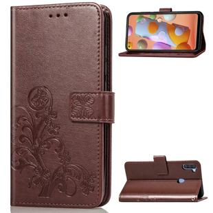 For Galaxy A11 Four-leaf Clasp Embossed Buckle Mobile Phone Protection Leather Case with Lanyard & Card Slot & Wallet & Bracket Function(Brown)