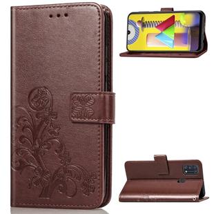 For Galaxy M31 Four-leaf Clasp Embossed Buckle Mobile Phone Protection Leather Case with Lanyard & Card Slot & Wallet & Bracket Function(Brown)
